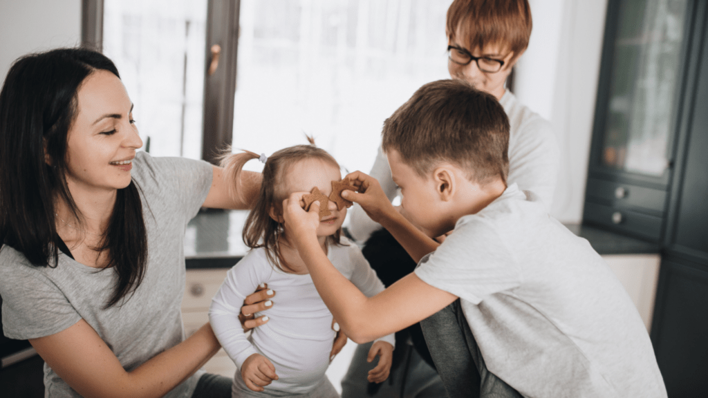 mom and 3 kids playing