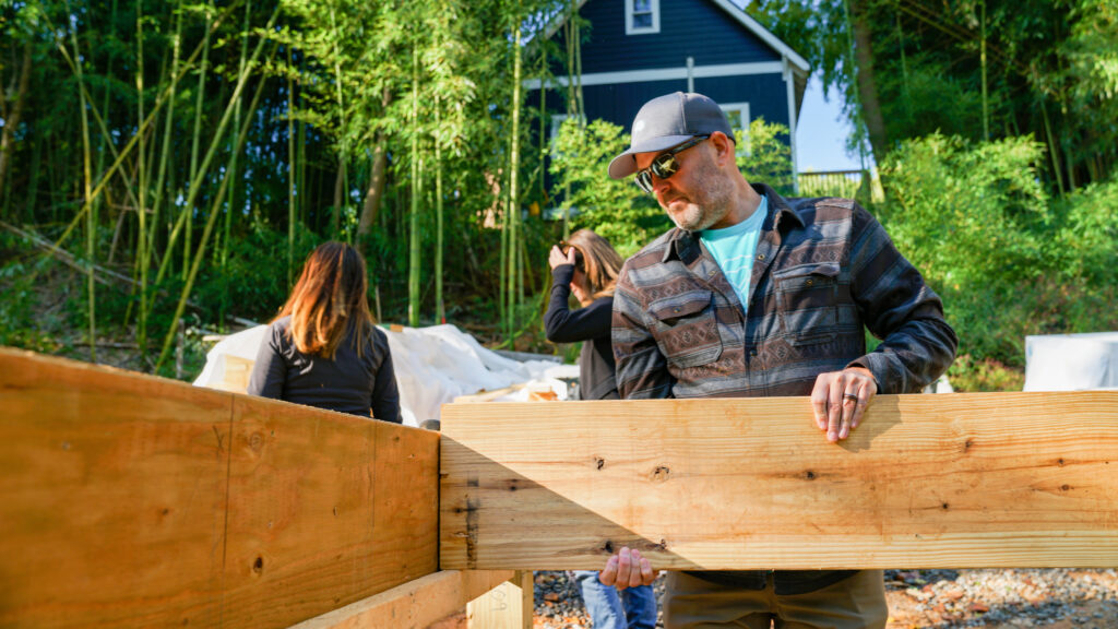 Quility Founder Brandon Ellison volunteering during Quility Giving Circle workday