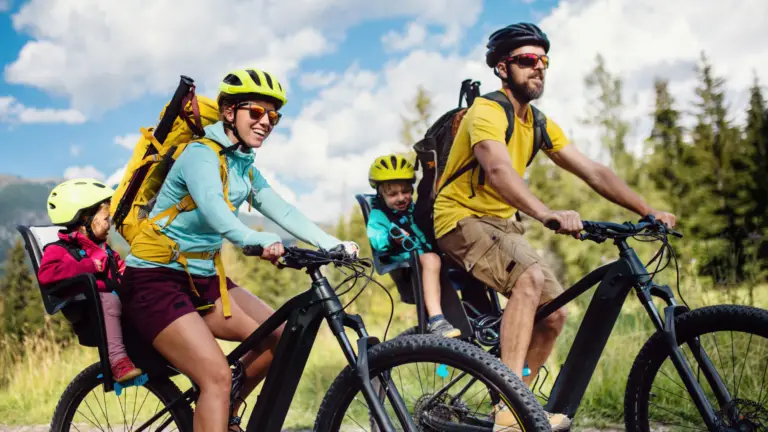 man and woman riding bikes life insurance day