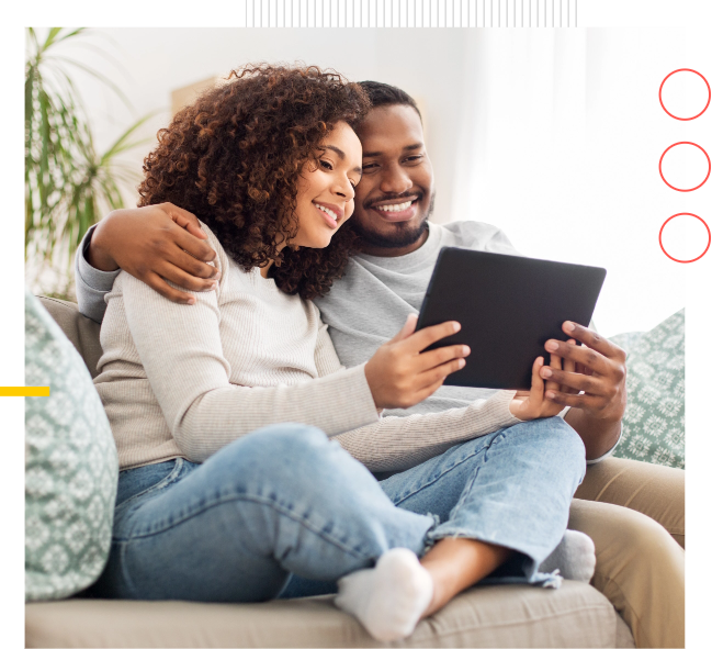 man and woman looking at tablet shopping online life insurance