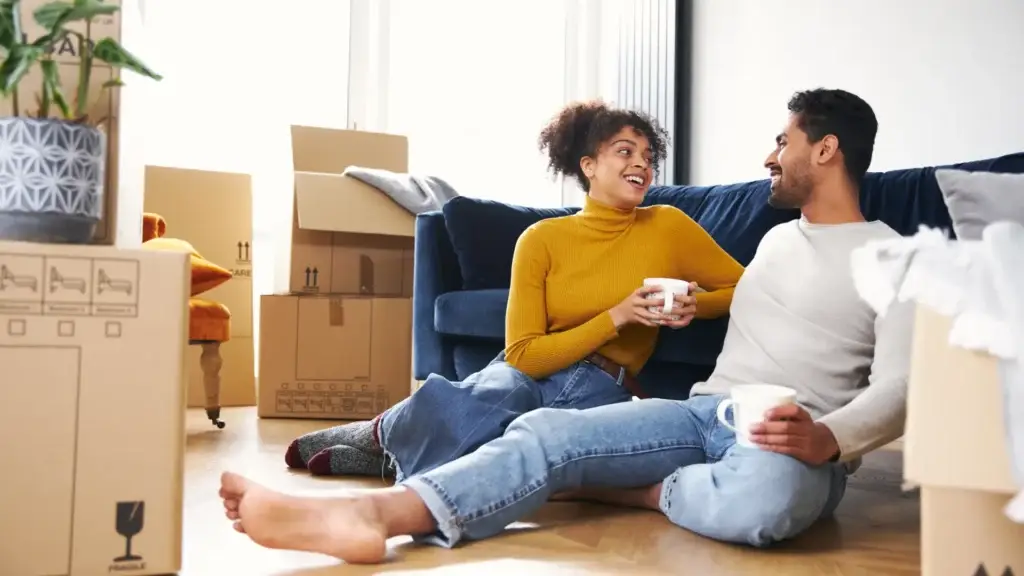 Couple in their new home, mortgage protection policyholders